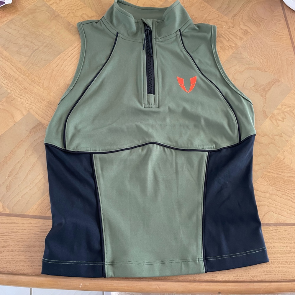“Firm Abs Top!” Amazing fit. I have several! Quarter zip. Never worn